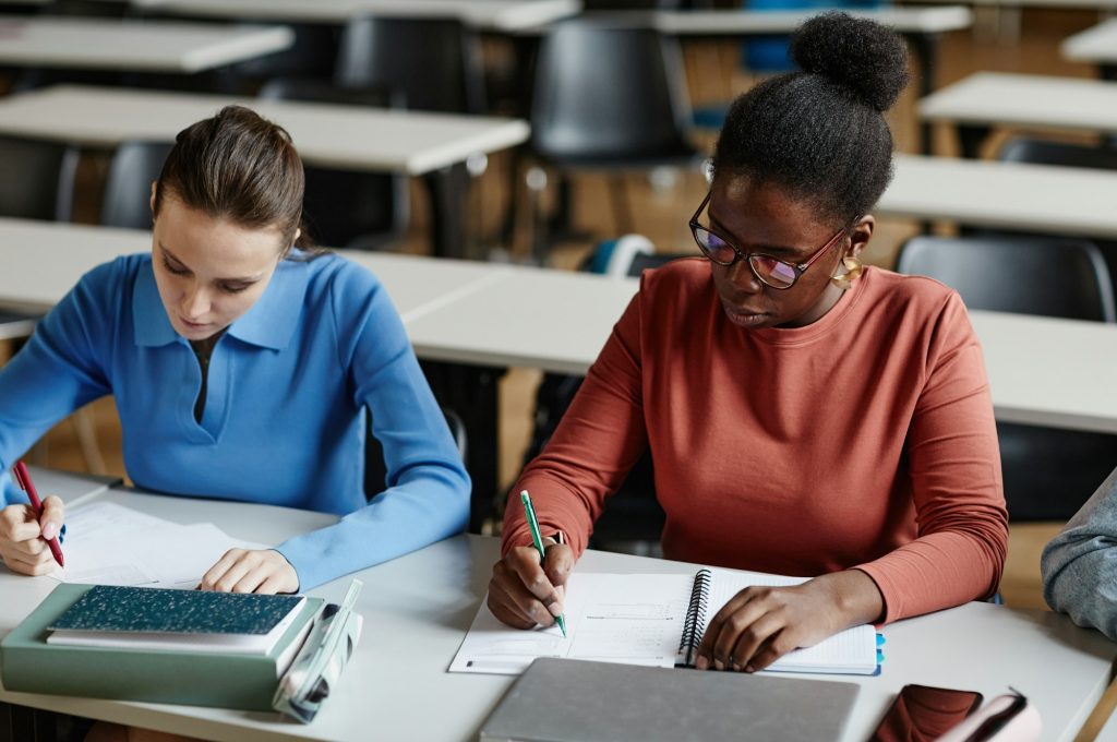 Students Taking Exam in School Closeup